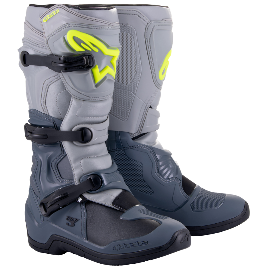 Gray and black motorcycle boots with a visible brand logo on a white background