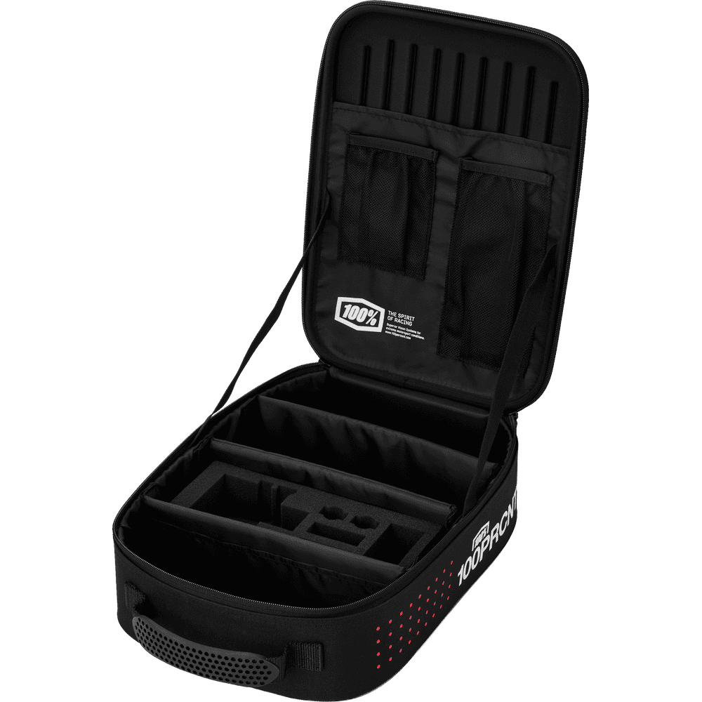 An open black 100% brand motorcycle goggle case with internal foam padding, organizer pockets, and a carry handle, shown on a white background.