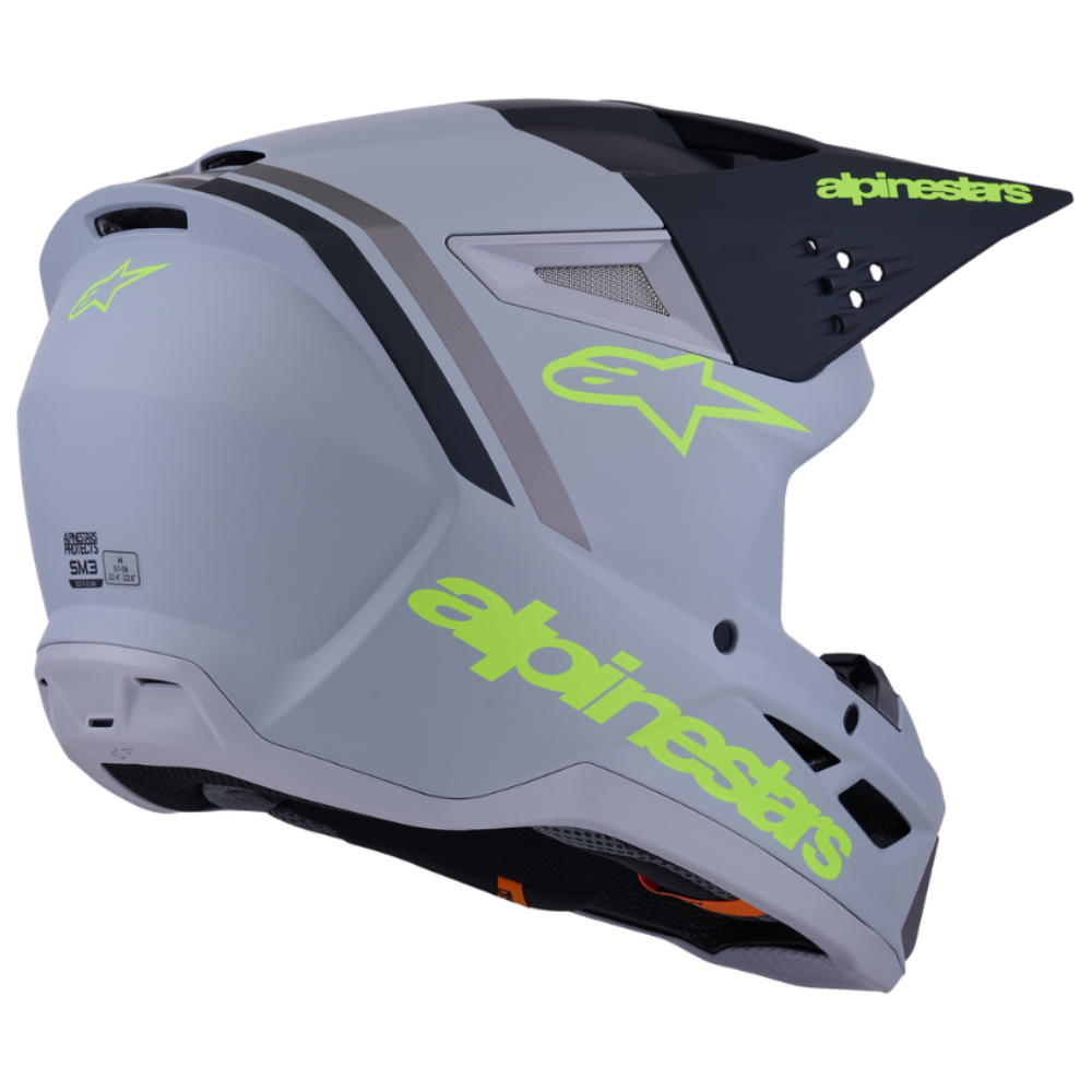 Gray helmet with green 'alpinestars' branding on a white background