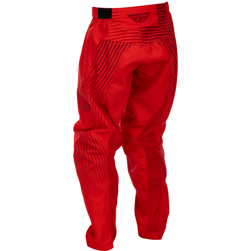 Red motocross pants with black diagonal stripe patterns and a black logo on the waistband, shown against a plain white background.
