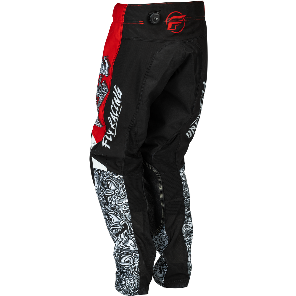 Black motocross pants with red side panels, white graphic patterns on the lower legs, and white Fly Racing branding, shown on a plain white background.