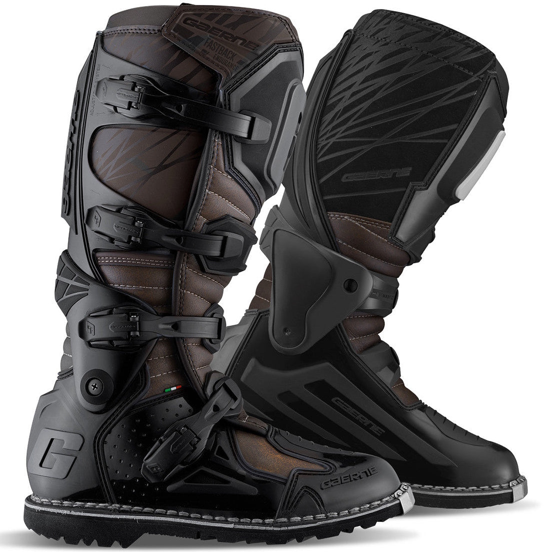 Pair of black motocross boots on a white background