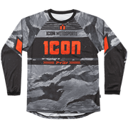 A long-sleeve motocross jersey with a gray and black camouflage pattern and bright orange accents. The chest features the text 'ICON MOTOSPORTS' and a large distressed orange 'ICON' logo, with additional Japanese text below.