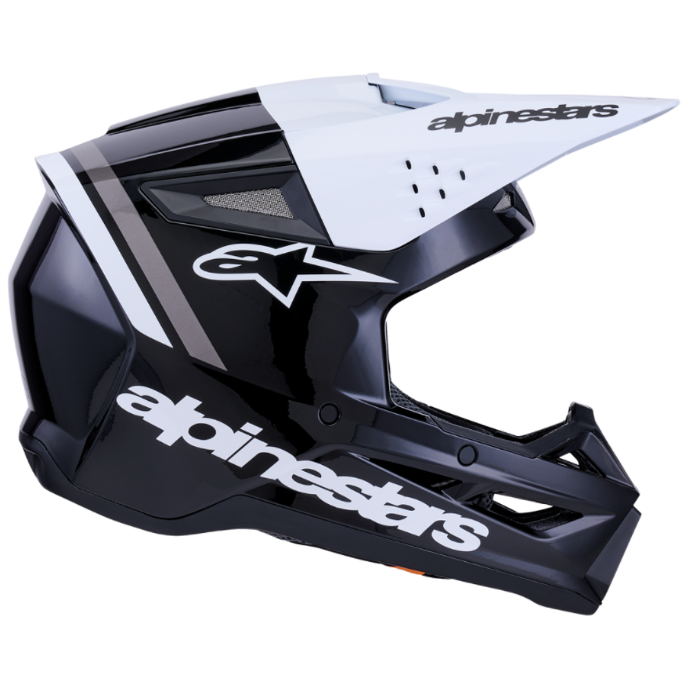 Black and white motocross helmet with 'Alpinestars' branding on a white background