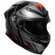 Black and red motorcycle helmet with 'AGV' branding on a white background
