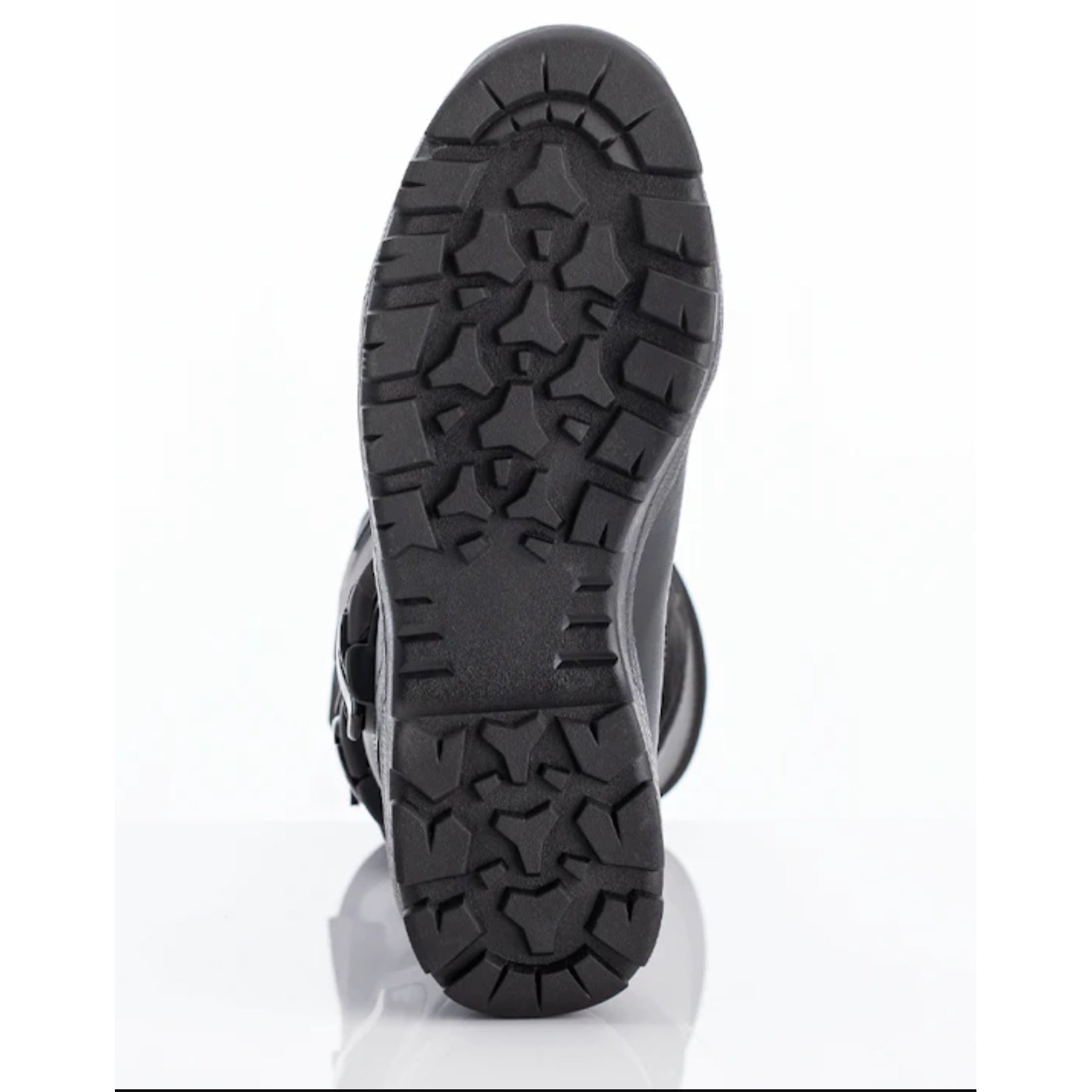 Black rubber sole of a shoe on a white background