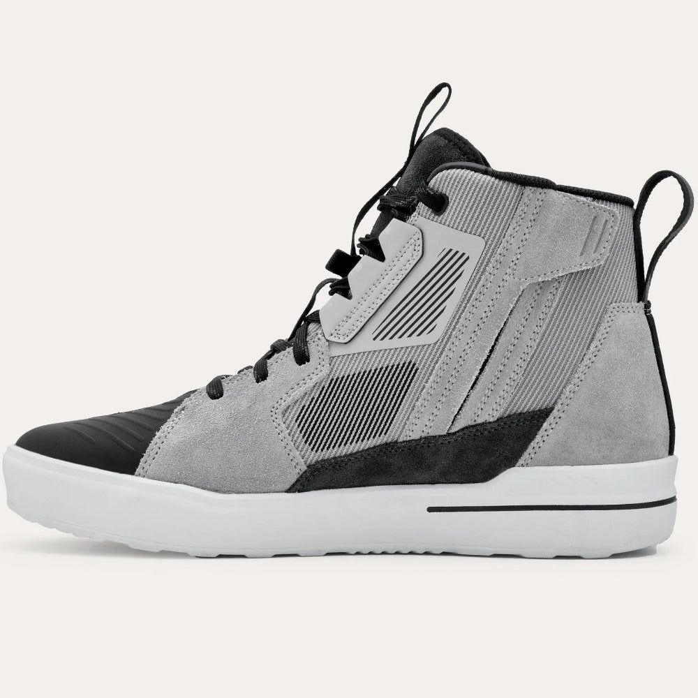 Gray high-top sneaker with black accents on a white background