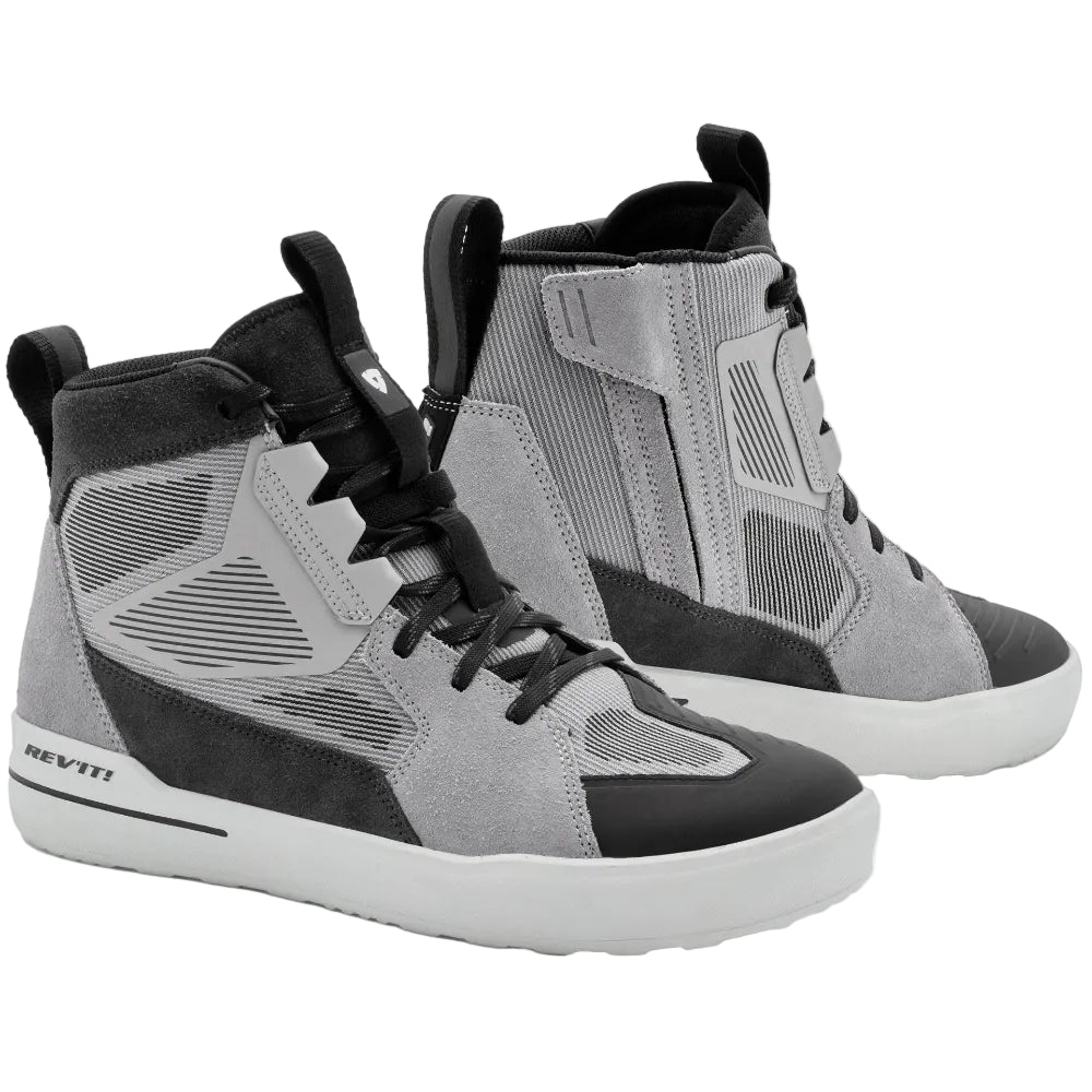 Gray and black high-top sneakers on a white background