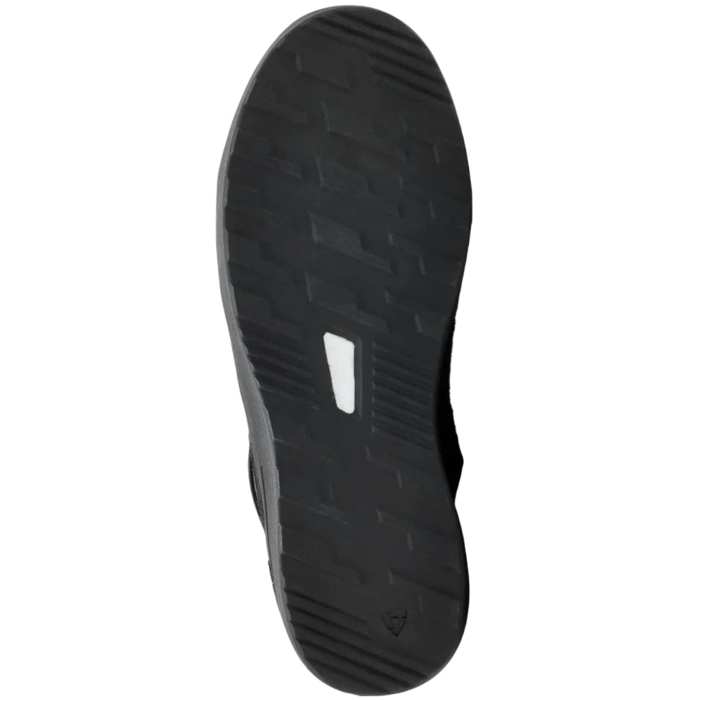 Black athletic shoe sole on a light gray background