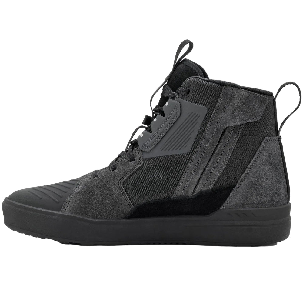Black high-top sneaker on a white background