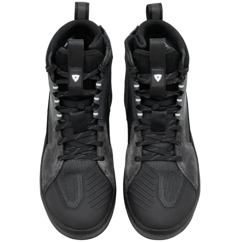 Pair of black high-top sneakers on a light gray background