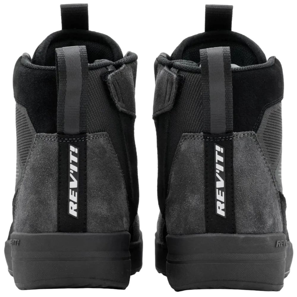Pair of black and gray high-top sneakers with 'REV'IT!' branding on a white background