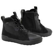 Pair of black high-top sneakers on a light gray background