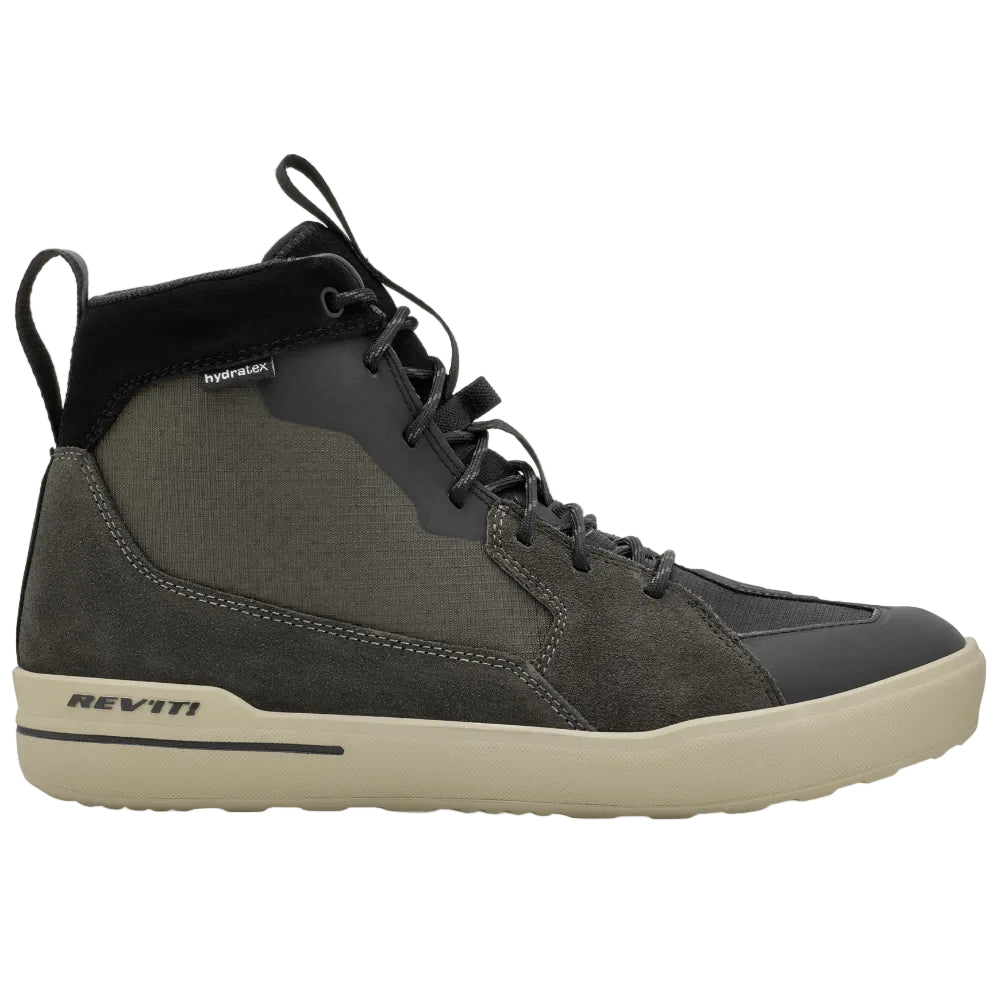 Black high-top sneaker with beige sole on a white background