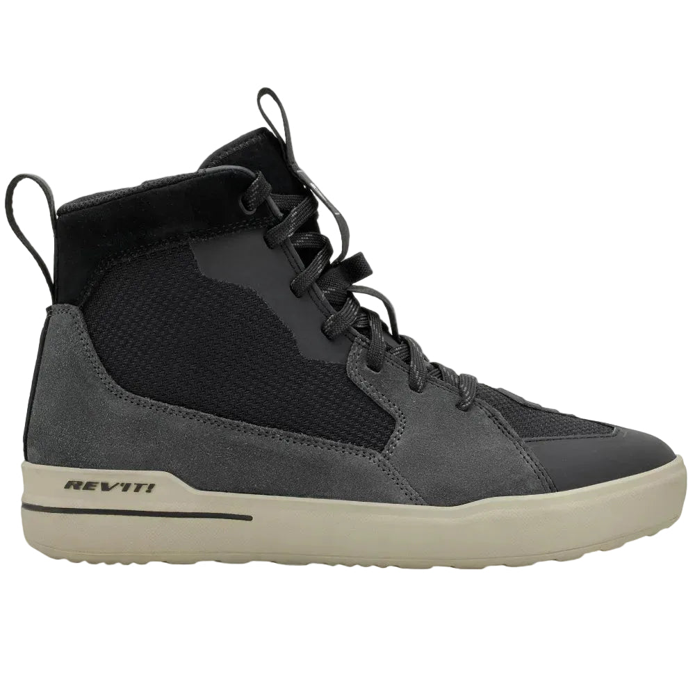 Black high-top sneaker with beige sole on a white background