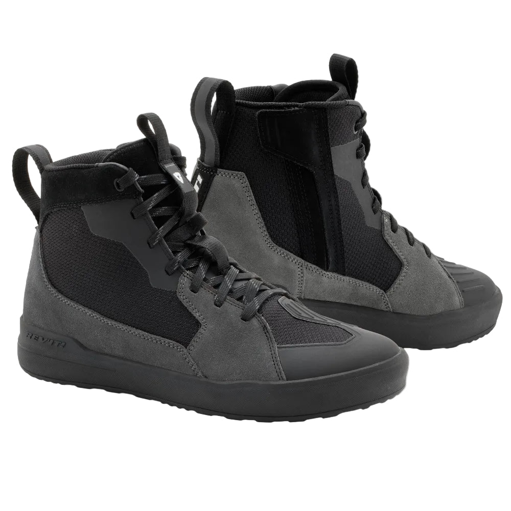Pair of gray high-top sneakers on a light gray background