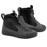 Pair of gray high-top sneakers on a light gray background
