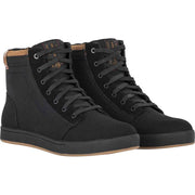 Pair of black high-top sneakers on a white background