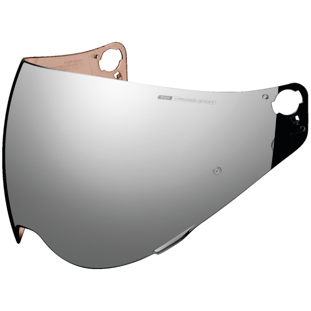 Motorcycle helmet visor with reflective surface on a white background