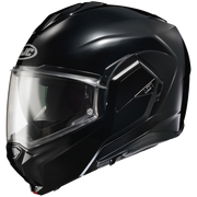 Black motorcycle helmet with clear visor on a white background