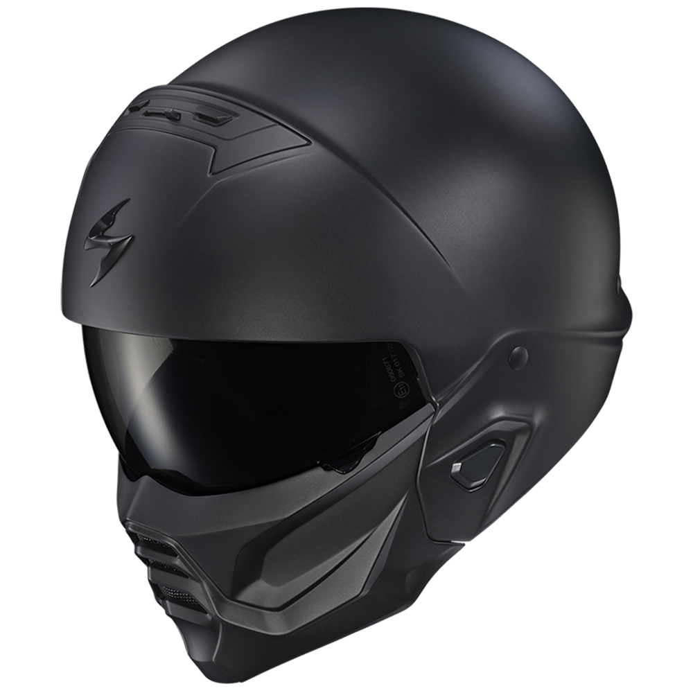 A matte black full-face motorcycle helmet with a dark visor, shown from a three-quarters angle against a plain white background.
