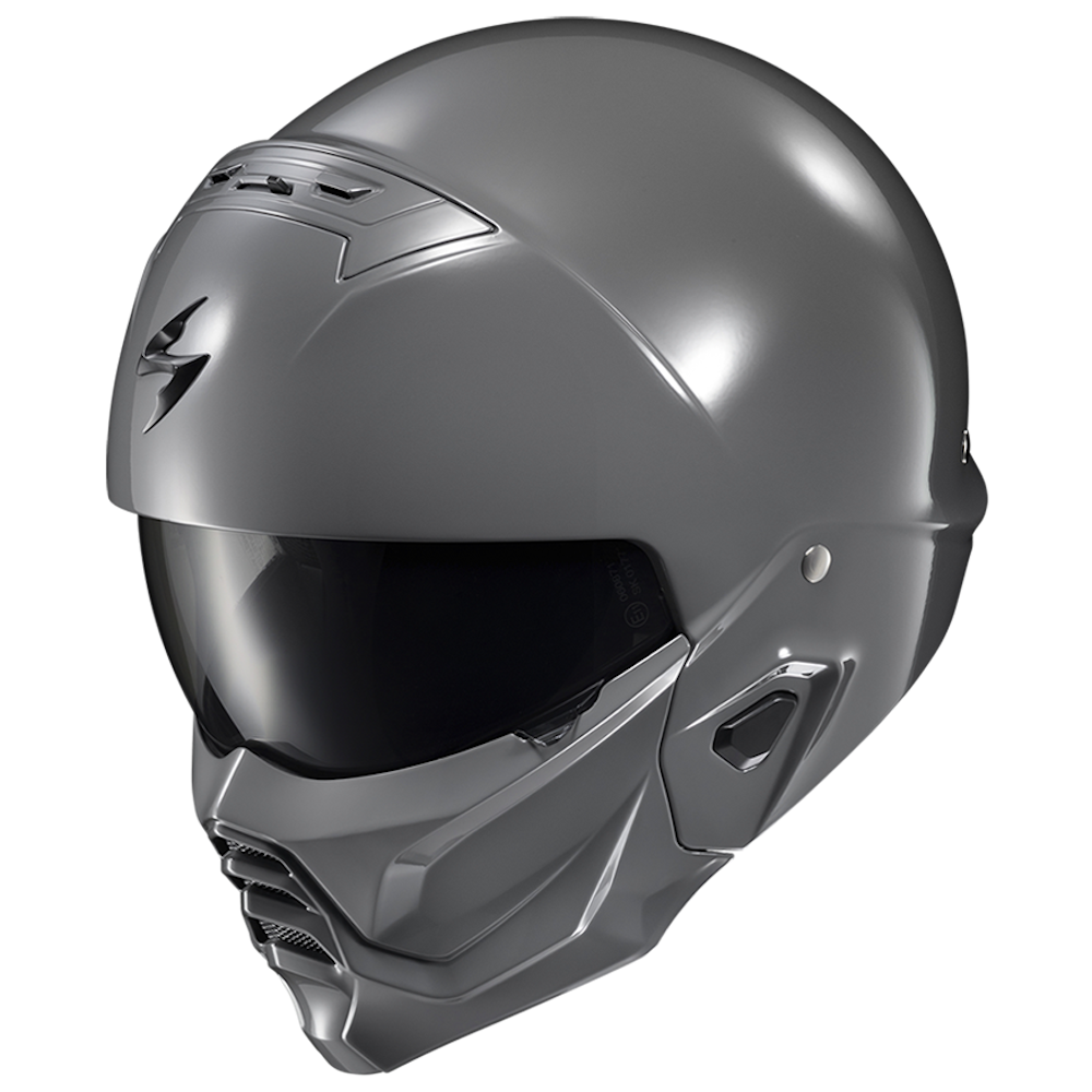 A matte dark gray full-face motorcycle helmet with a dark visor, shown from a three-quarters angle on a plain white background.