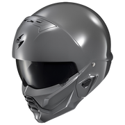 A matte dark gray full-face motorcycle helmet with a dark visor, shown from a three-quarters angle on a plain white background.