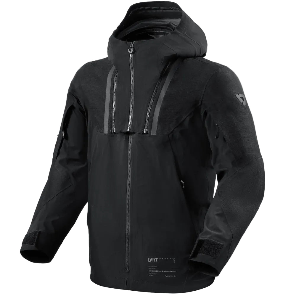 A black hooded technical jacket with a full front zipper, zippered chest pockets, and subtle gray reflective-looking vertical details on the upper chest, shown on a plain light beige studio background.