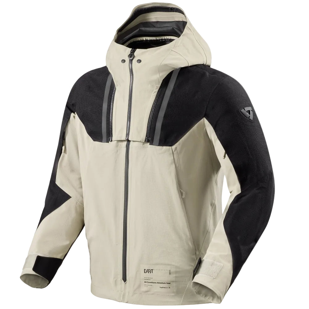A hooded technical jacket in a colorblock design of off-white and black, featuring a full-length front zipper, gray reflective striping on the shoulders, and a small triangular logo on the left sleeve.