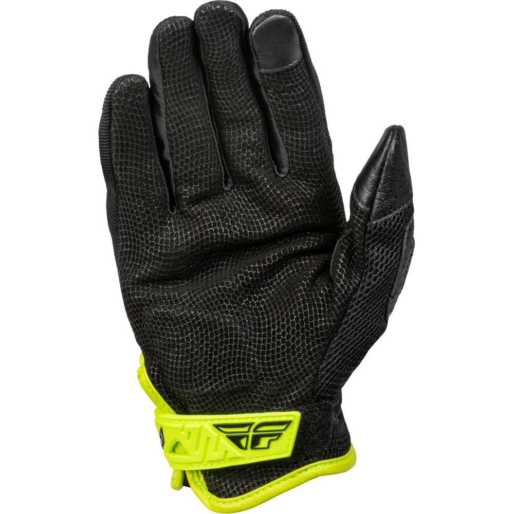 Black glove with yellow wristband on a white background