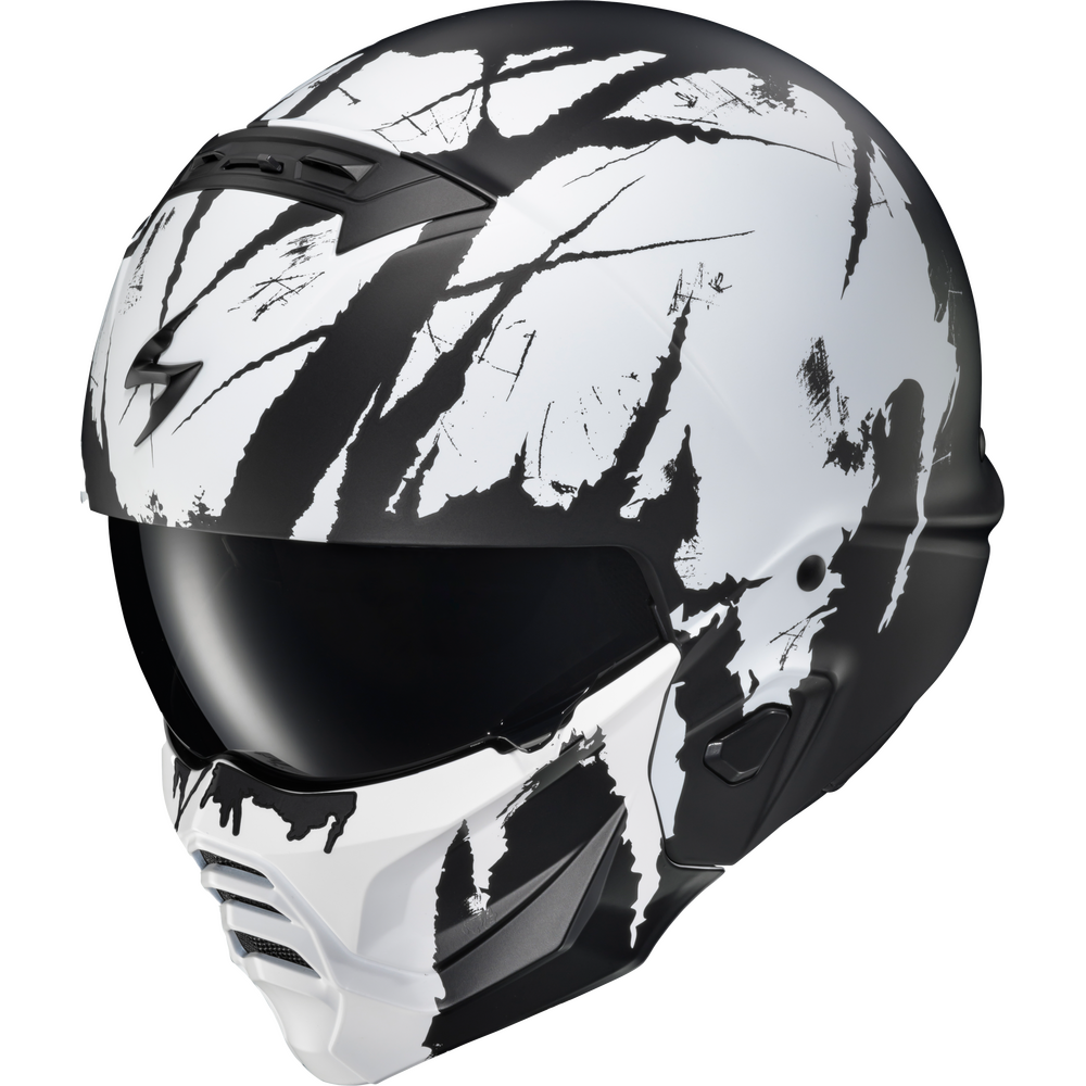A full-face motorcycle helmet with a glossy white and black abstract paint-splatter design, featuring a dark visor and a stylized lightning bolt logo on the side.