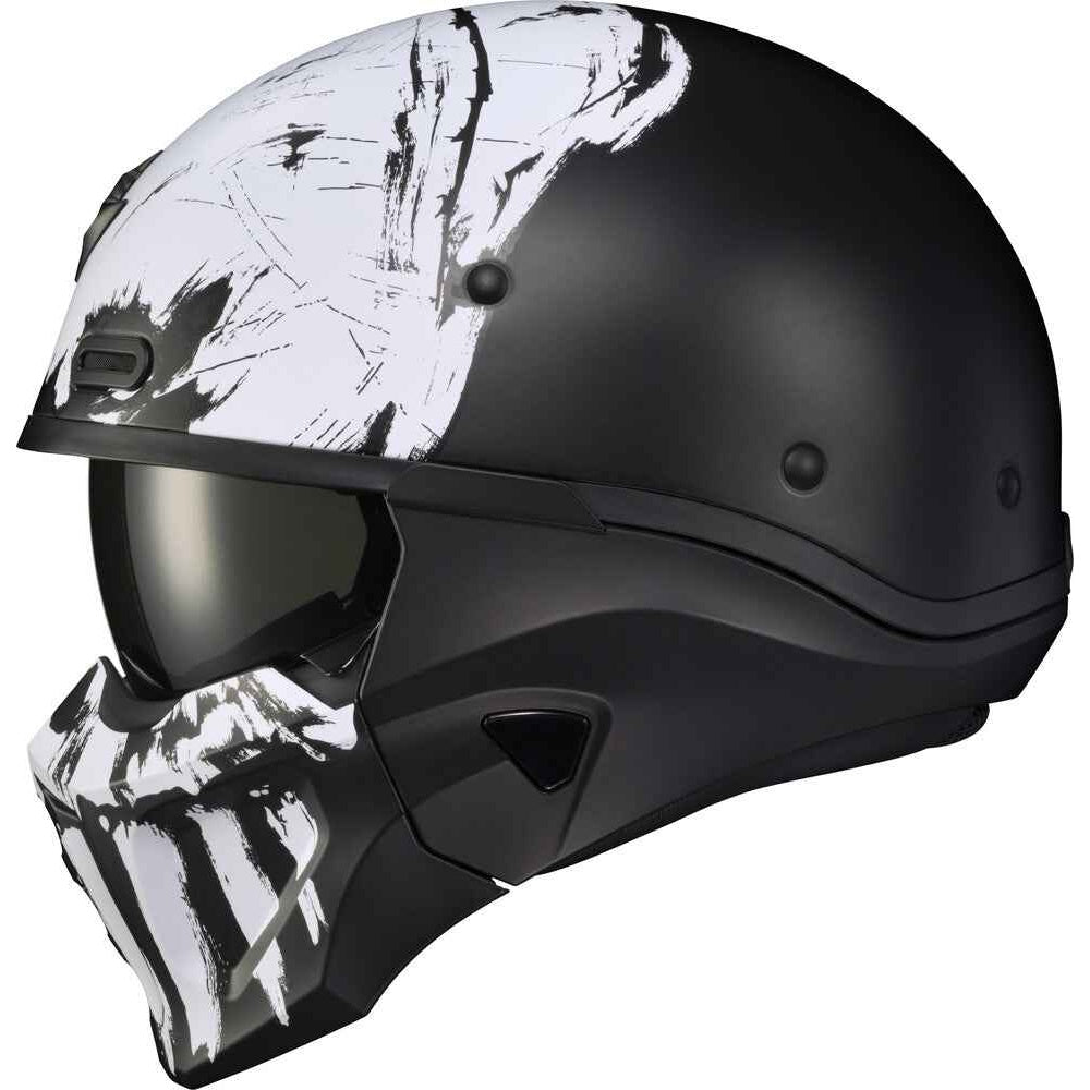 A motorcycle helmet in matte black with a white skull graphic design on the top and lower face shield, shown against a plain white background.