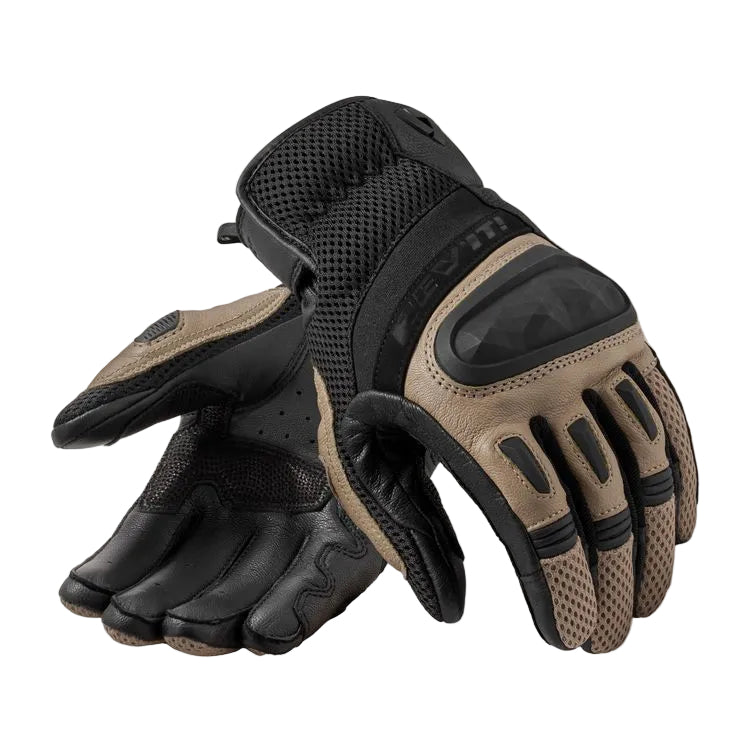 Pair of black and brown gloves on a white background