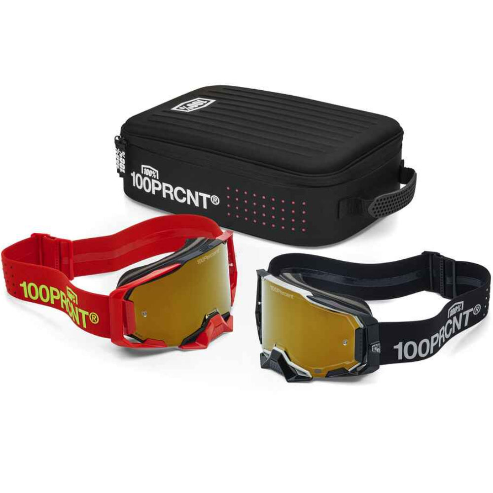 Two 100% RCNT motocross goggles with yellow mirrored lenses, one in red and one in black, displayed alongside a black zippered carrying case on a white background.
