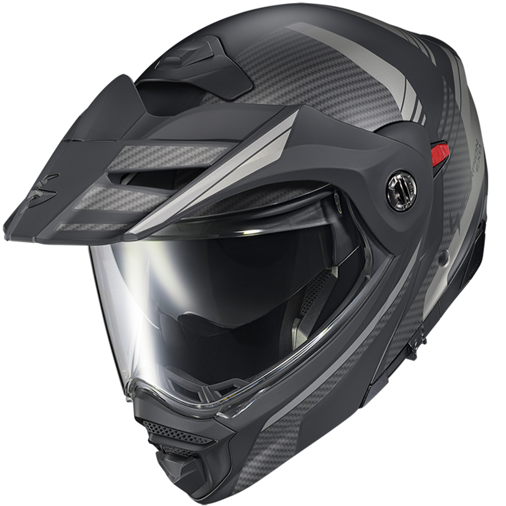 A matte black and dark gray carbon fiber pattern full-face motorcycle helmet with a clear visor, shown at a three-quarter angle on a white background.