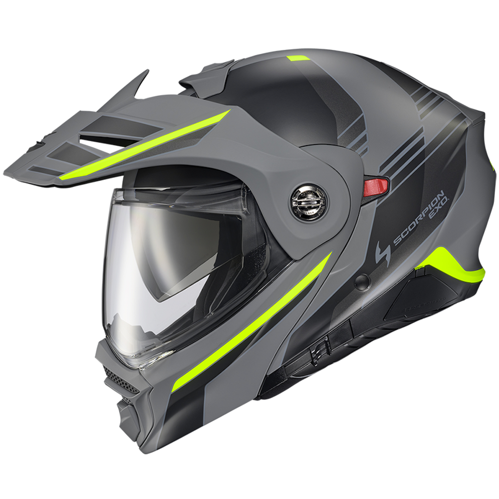 A dark gray full-face motorcycle helmet with a clear visor, featuring bright neon yellow-green accents and a small red detail on the side, shown against a plain white background.