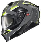 A full-face motorcycle helmet in matte black and dark gray with bright neon yellow-green accents, featuring a clear visor and the brand name 'KASKAP' printed on the side.