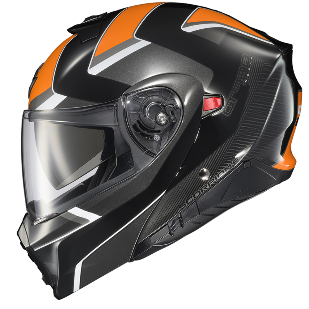 A full-face motorcycle helmet in a glossy black finish with vibrant orange and white graphic accents, shown from a three-quarters angle against a plain white background.