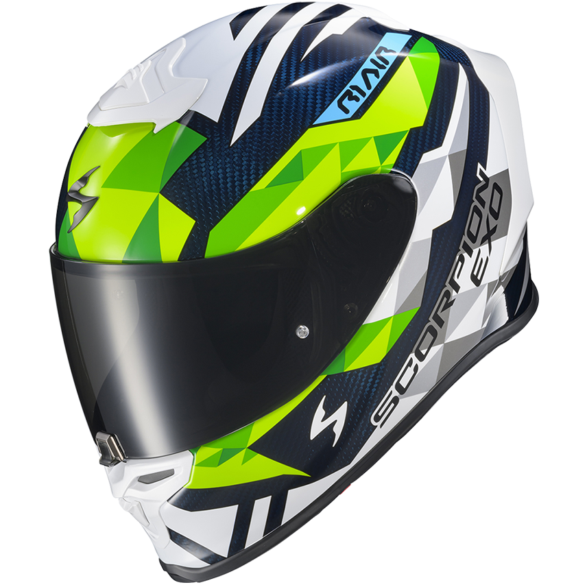 A full-face motorcycle helmet with a white, black, and neon green geometric graphic design, featuring a dark visor. The brand 'Scorpion' is clearly visible on the side of the helmet.