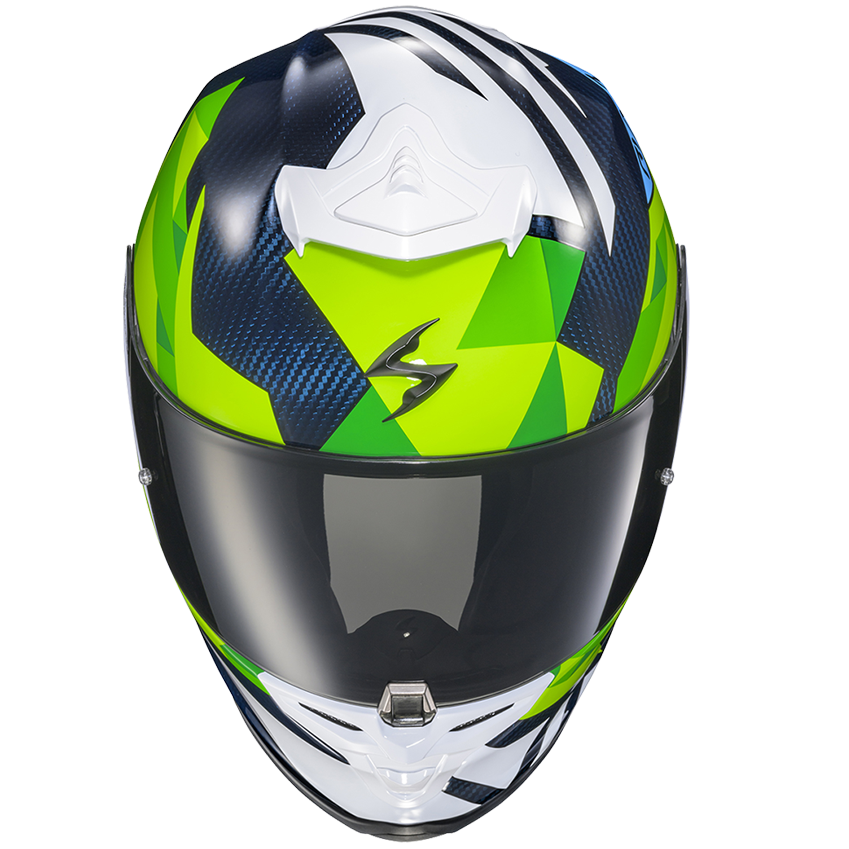A full-face motorcycle helmet with a geometric pattern in neon green, dark blue, white, and black, featuring a dark visor, shown on a plain white background.