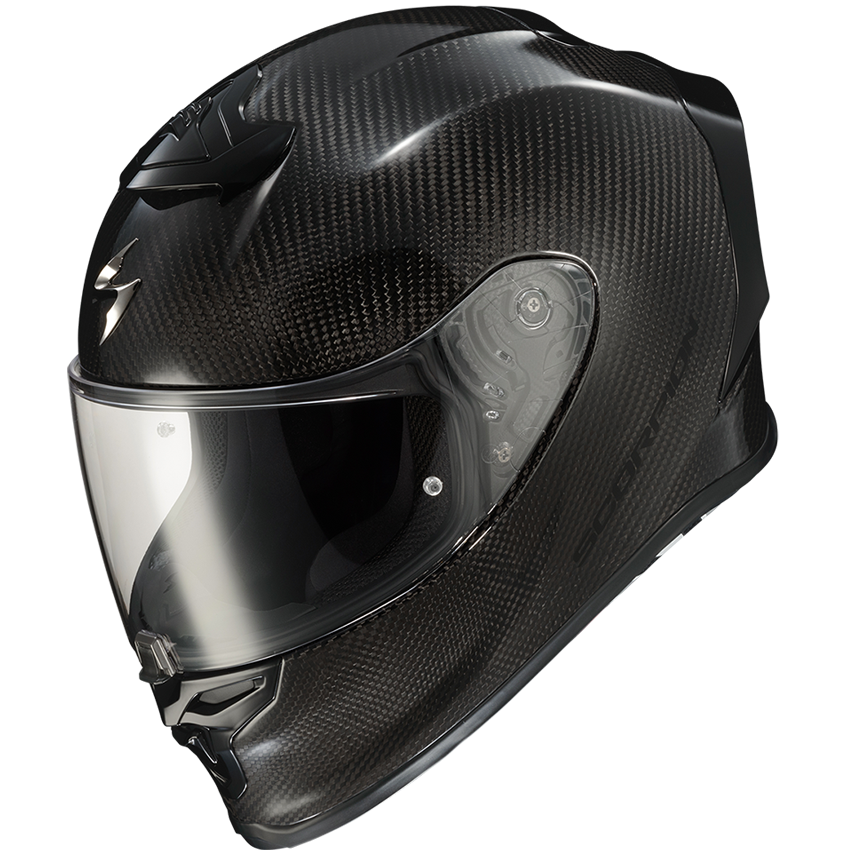 A full-face motorcycle helmet with a glossy black carbon fiber weave pattern and a clear visor, shown from a three-quarters angle on a white background.