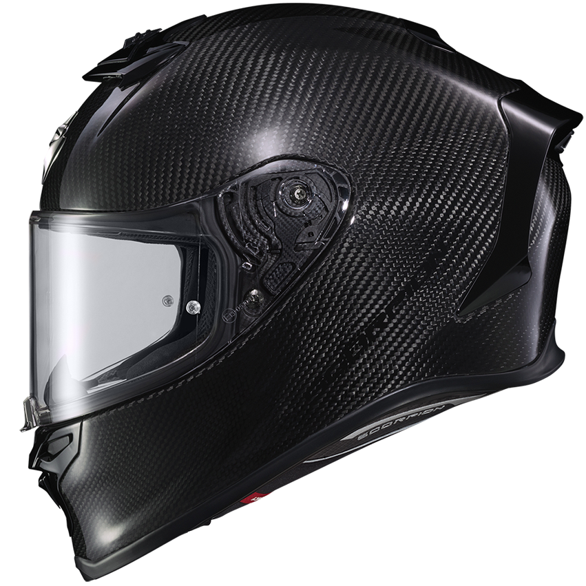 A full-face motorcycle helmet with a glossy black carbon fiber pattern, featuring a clear visor and a small red accent near the chin, shown against a plain white background.