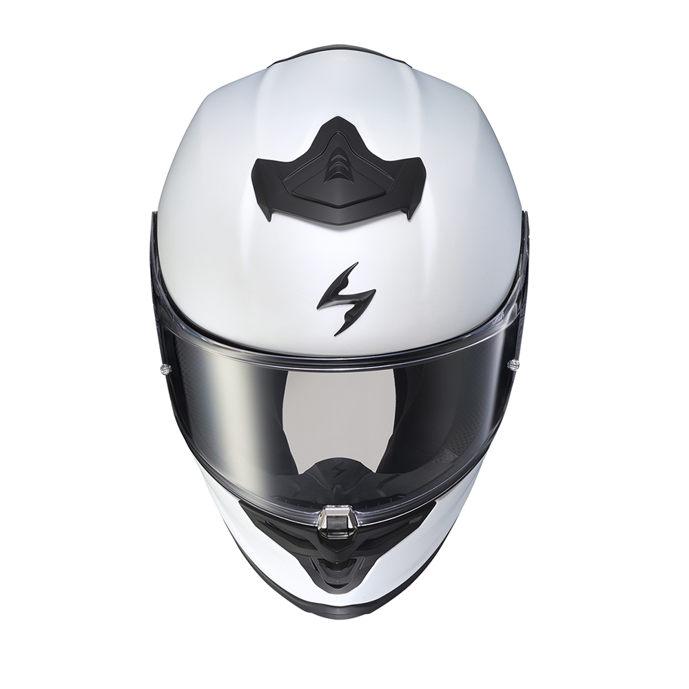 A white full-face motorcycle helmet with a clear visor, featuring a black chin guard and a stylized black logo on the forehead, shown against a plain white background.