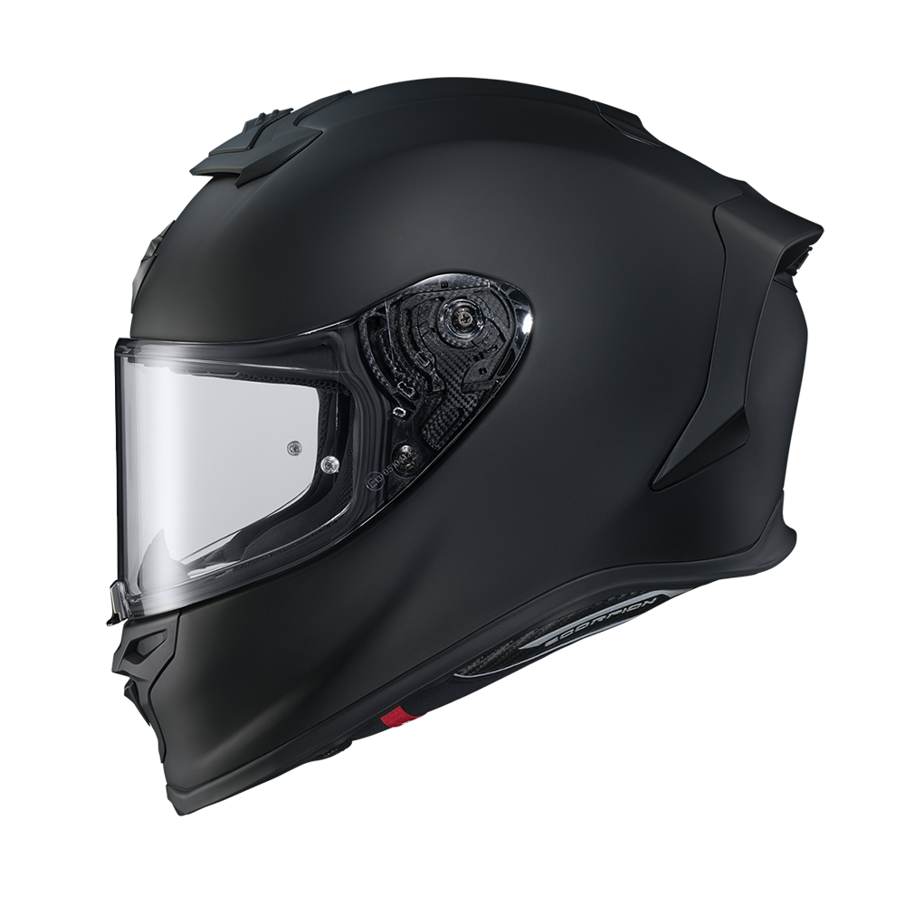 A matte black full-face motorcycle helmet with a clear visor, shown in a side profile view against a plain white background.