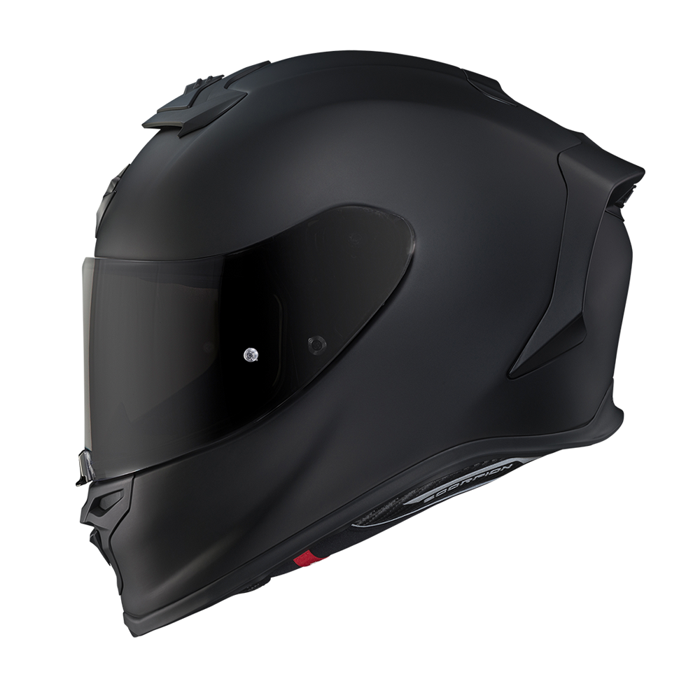 A matte black full-face motorcycle helmet with a dark visor, shown in a three-quarter side profile against a plain white background.