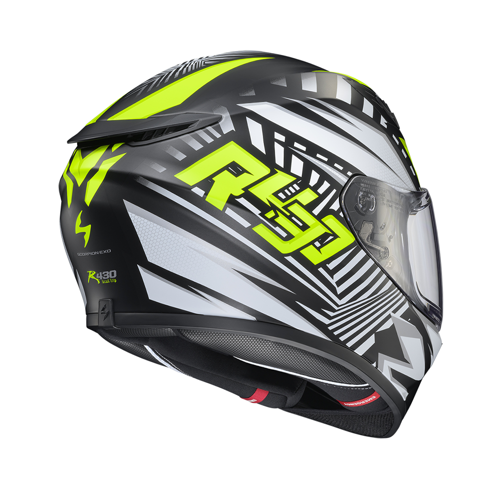 A full-face motorcycle helmet in black, white, and neon yellow-green, featuring a clear visor and the 'RSG' logo on the side.