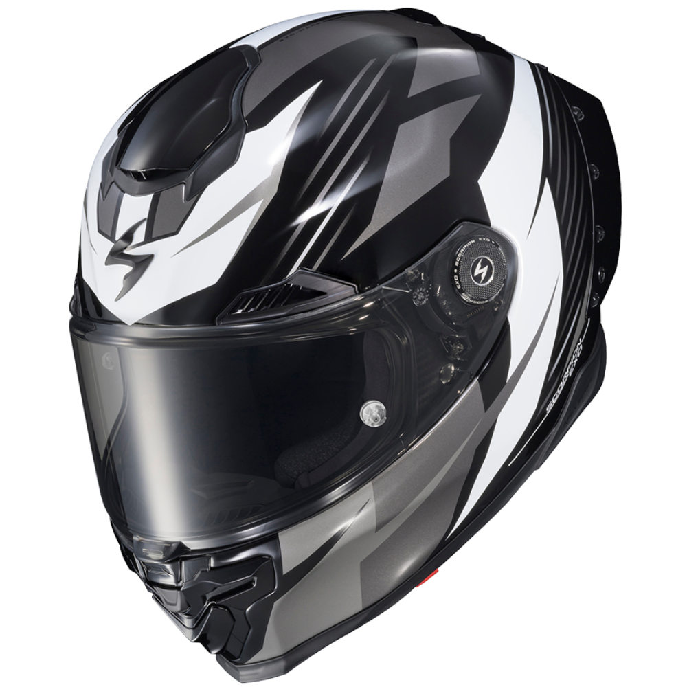 A full-face motorcycle helmet in glossy black and white with a dark visor, shown at a three-quarter angle on a plain white background.