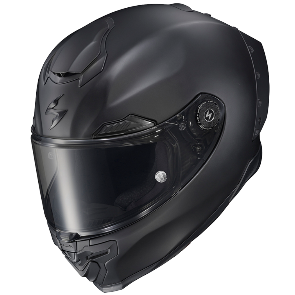 A matte black full-face motorcycle helmet with a dark visor, shown from a three-quarters angle on a plain white background.
