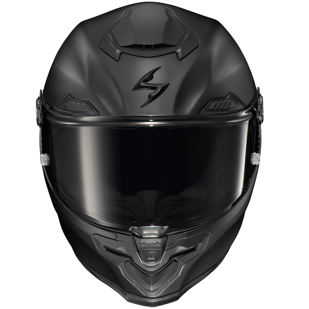 A matte black full-face motorcycle helmet with a dark tinted visor, featuring a stylized 'S' logo on the forehead, shown against a plain white background.