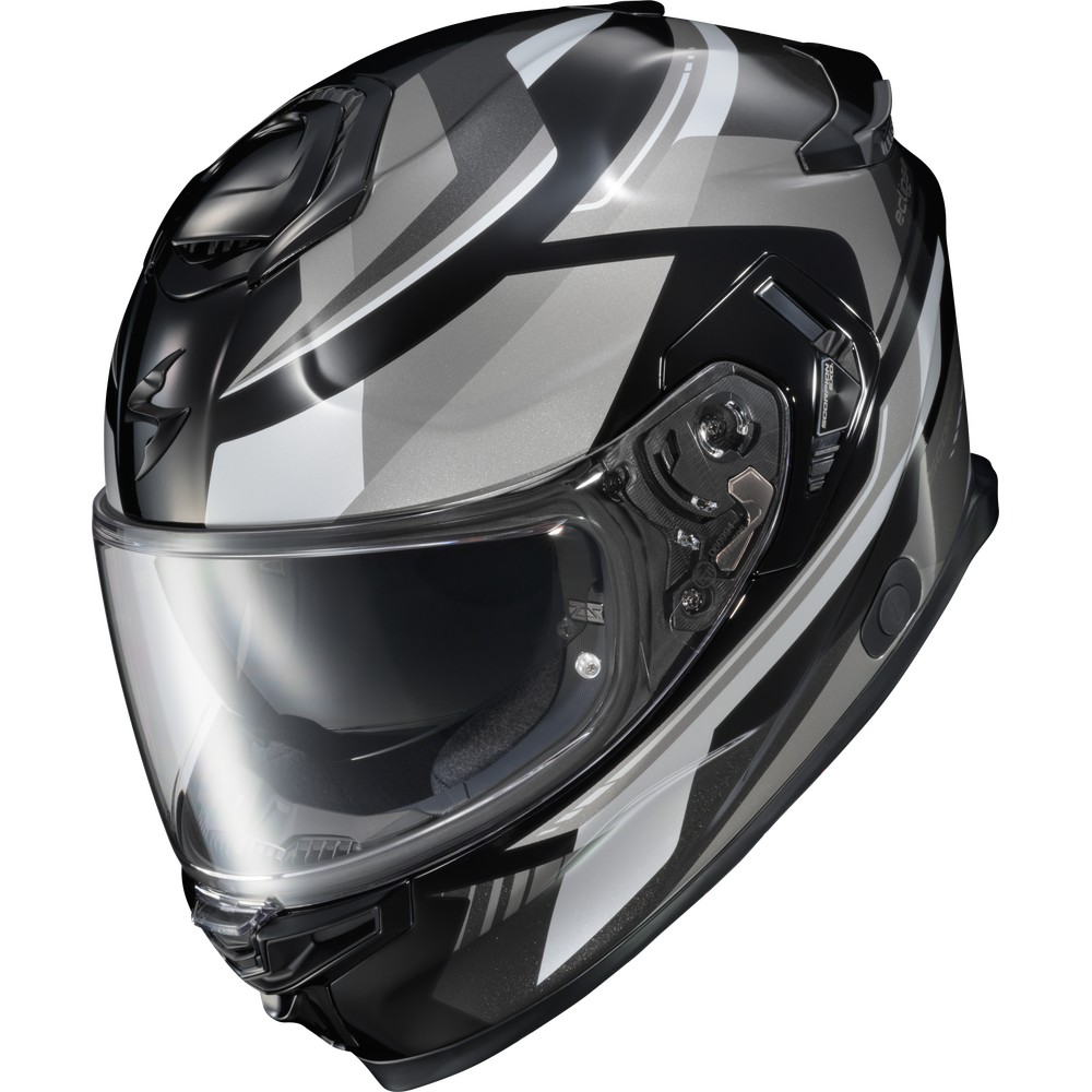 A full-face motorcycle helmet in a glossy black and metallic silver graphic pattern, featuring a clear visor, shown against a plain white background.